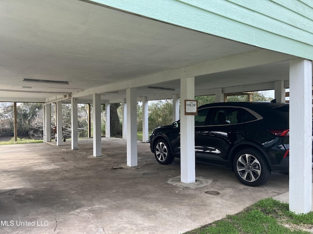 garage with a carport