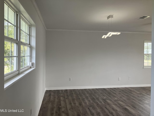 unfurnished room with dark hardwood / wood-style floors and ornamental molding