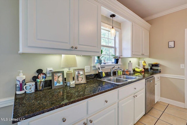 449 Abbey Woods, Brandon, MS 39047 - kitchen with stainless steel dishwasher, white cabinets, crown molding, light tile patterned floors, and decorative light fixtures