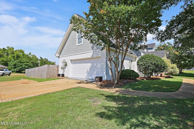 449 Abbey Woods, Brandon, MS 39047 - view of side of home featuring an attached garage and driveway