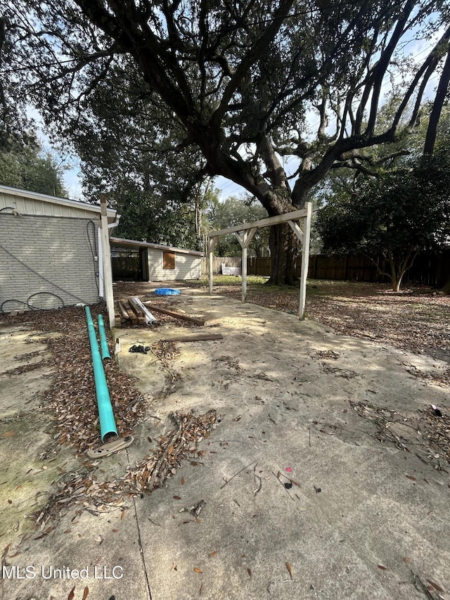 view of yard featuring fence