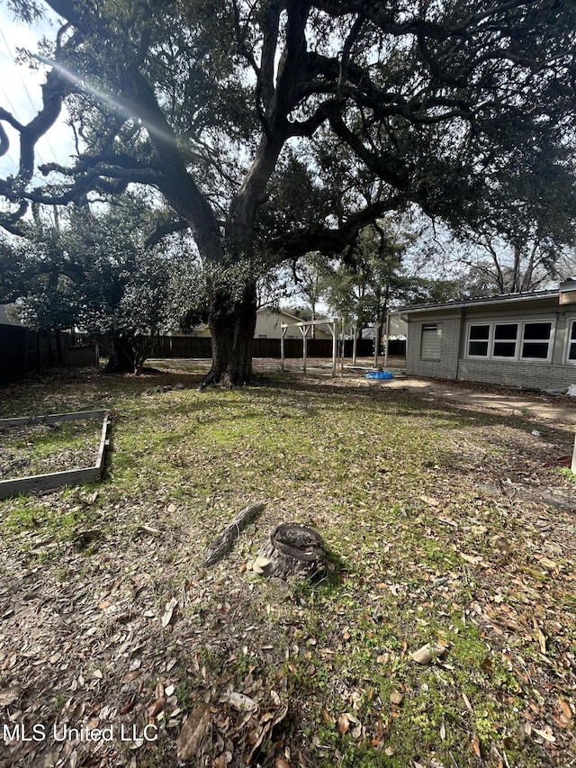 view of yard featuring fence