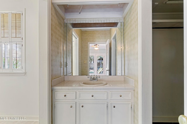 bathroom with vanity and ceiling fan