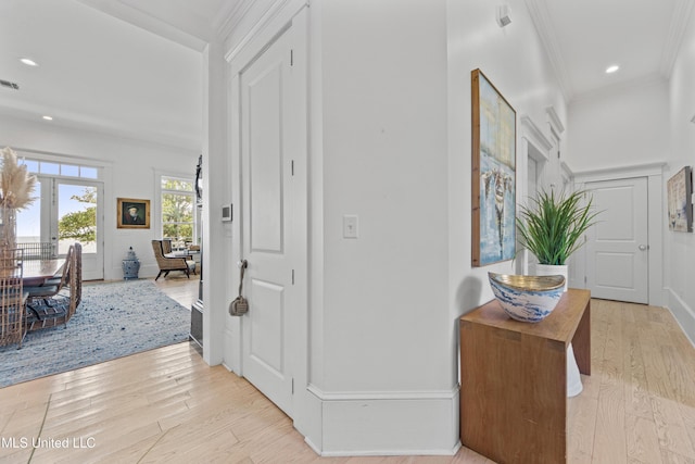 1221 E Beach Blvd, Pass Christian, MS 39571 - hall with ornamental molding, light wood-style flooring, recessed lighting, and baseboards