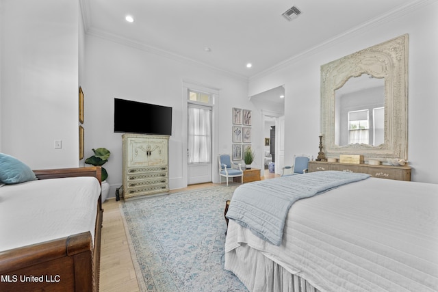 1221 E Beach Blvd, Pass Christian, MS 39571 - bedroom featuring ornamental molding, light wood finished floors, recessed lighting, and baseboards