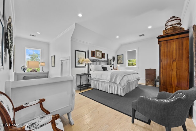 1221 E Beach Blvd, Pass Christian, MS 39571 - bedroom featuring crown molding, multiple windows, recessed lighting, wood finished floors, and baseboards