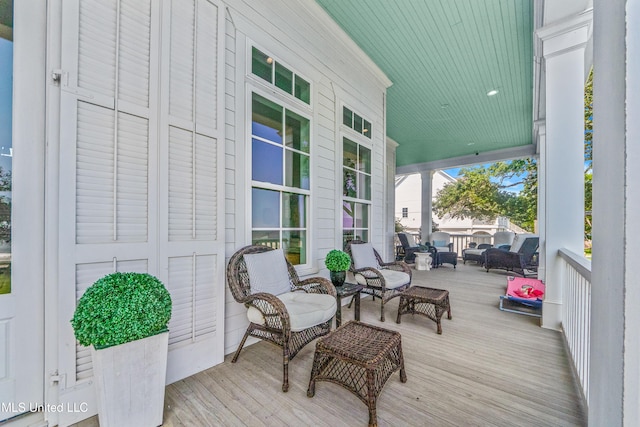 1221 E Beach Blvd, Pass Christian, MS 39571 - porch with outdoor lounge area