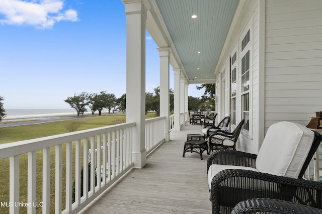 1221 E Beach Blvd, Pass Christian, MS 39571 - porch with a water view