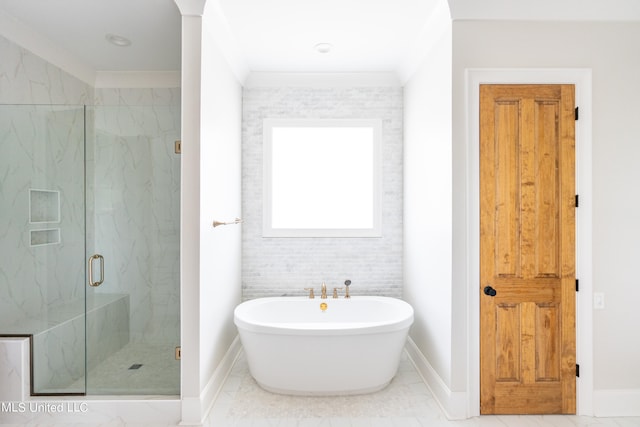 bathroom featuring crown molding and plus walk in shower