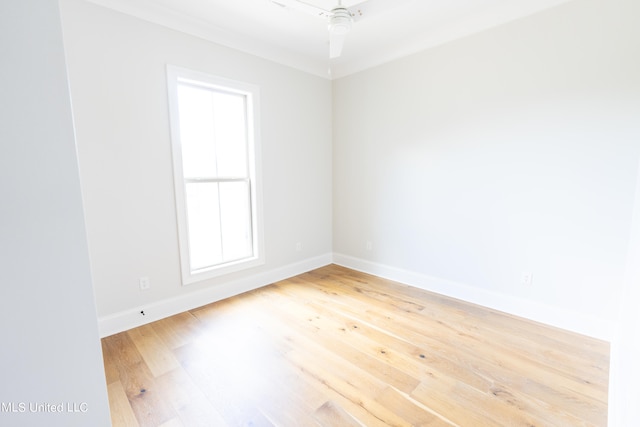 spare room featuring ceiling fan and wood-type flooring