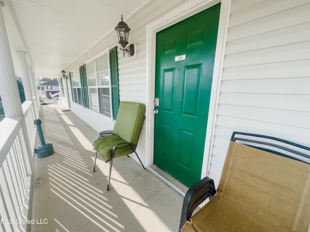 5080 Gautier Vancleave Rd Unit D-8, Gautier, MS 39553 - property entrance with a porch