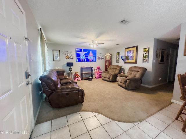 5080 Gautier Vancleave Rd Unit D-8, Gautier, MS 39553 - living room with light colored carpet, a ceiling fan, light tile patterned floors, and baseboards