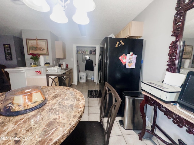 5080 Gautier Vancleave Rd Unit D-8, Gautier, MS 39553 - dining area featuring light tile patterned floors and a chandelier