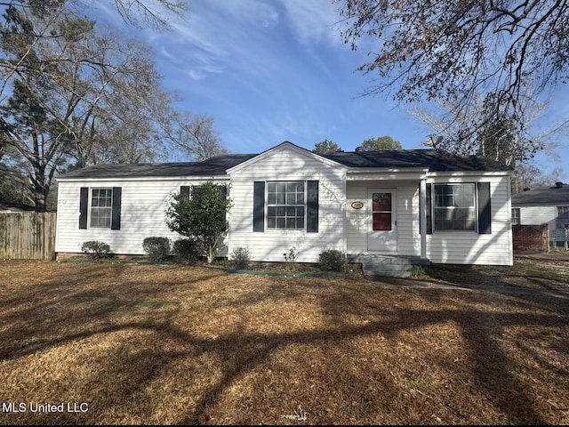 single story home with a front lawn