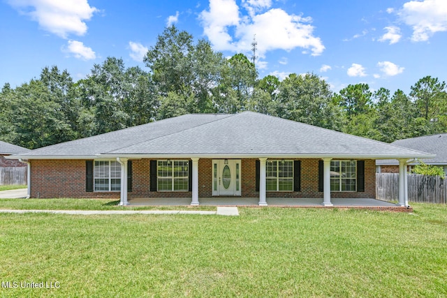 ranch-style home with a front yard