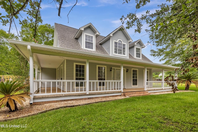 16609 Old River Rd, Vancleave, MS 39565 - farmhouse with roof with shingles, a front lawn, and covered porch