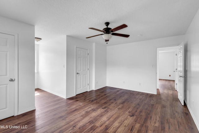 16609 Old River Rd, Vancleave, MS 39565 - spare room featuring a ceiling fan, dark wood finished floors, baseboards, and a smoke detector