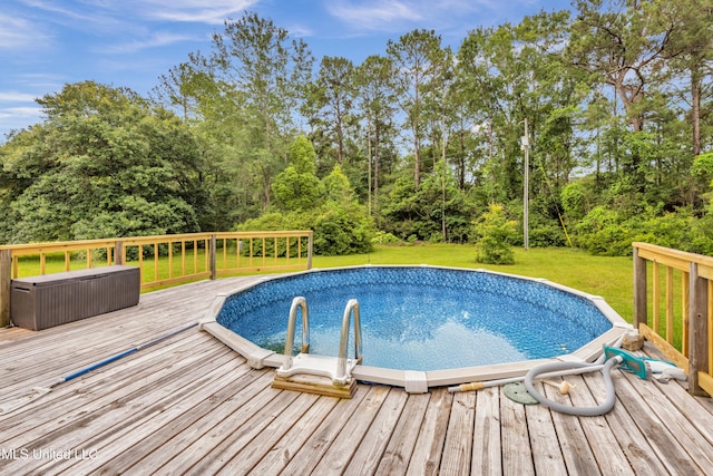16609 Old River Rd, Vancleave, MS 39565 - swimming pool featuring a lawn and a deck