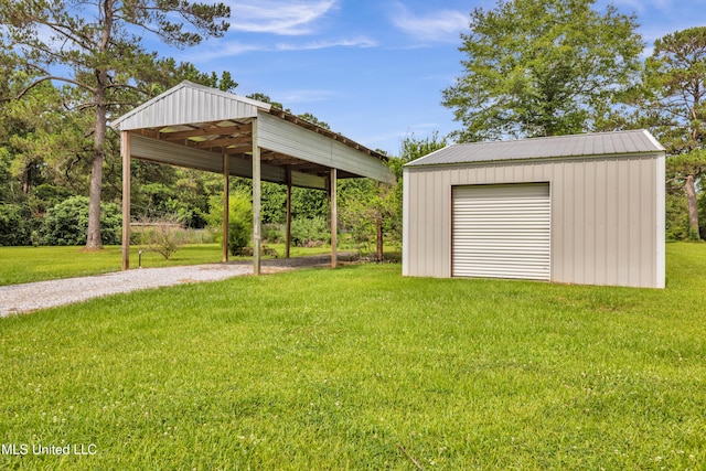 16609 Old River Rd, Vancleave, MS 39565 - exterior space with driveway and a detached garage