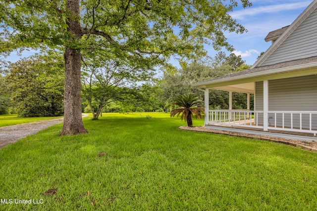 16609 Old River Rd, Vancleave, MS 39565 - view of green lawn featuring covered porch