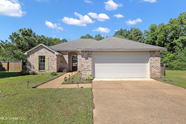 217 Belle Chasse Cir, Jackson, MS 39272 - view of front of house featuring concrete driveway, brick siding, an attached garage, and a shingled roof