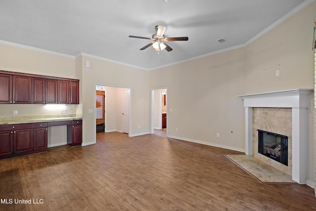 217 Belle Chasse Cir, Jackson, MS 39272 - unfurnished living room featuring ceiling fan, wood finished floors, crown molding, a fireplace, and baseboards