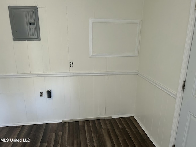 washroom featuring electric panel and dark wood-type flooring