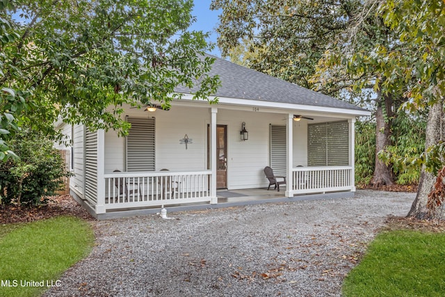 view of front of house featuring ceiling fan and covered porch