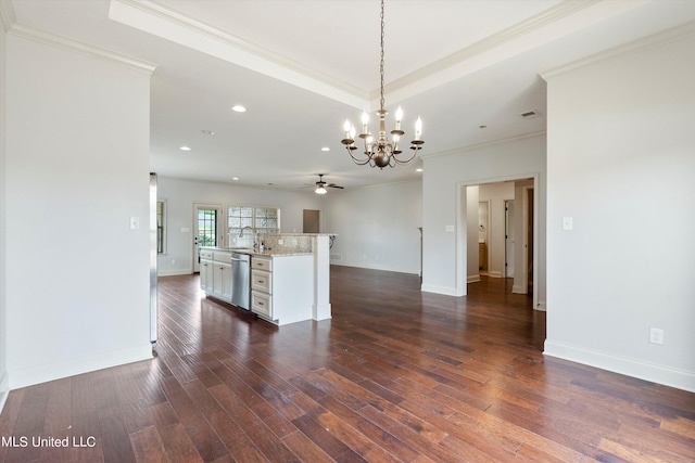 kitchen featuring dishwasher, sink, pendant lighting, white cabinets, and dark wood-type flooring