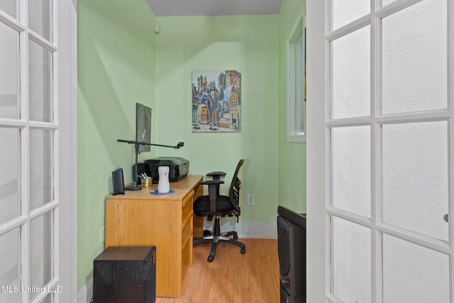 office featuring hardwood / wood-style flooring