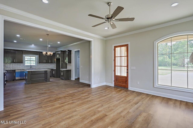 kitchen featuring wood-type flooring, a center island, and a wealth of natural light