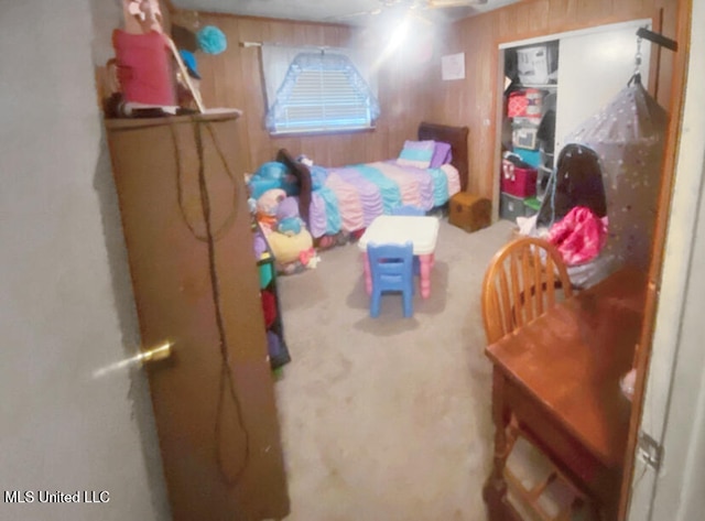 305 Bazinsky Rd, Vicksburg, MS 39180 - bedroom featuring wood walls and carpet flooring