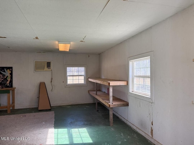 basement with a wall mounted AC