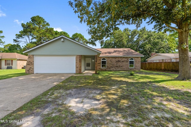 2518 El Viernes St, Gautier, MS 39553 - ranch-style home featuring brick siding, driveway, and a garage