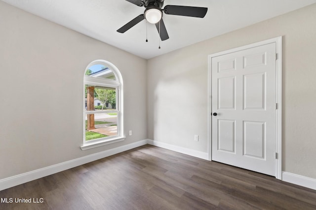 2518 El Viernes St, Gautier, MS 39553 - spare room featuring dark wood-style flooring and a ceiling fan