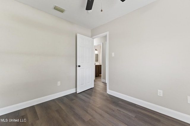 2518 El Viernes St, Gautier, MS 39553 - empty room featuring a ceiling fan and dark wood-style flooring