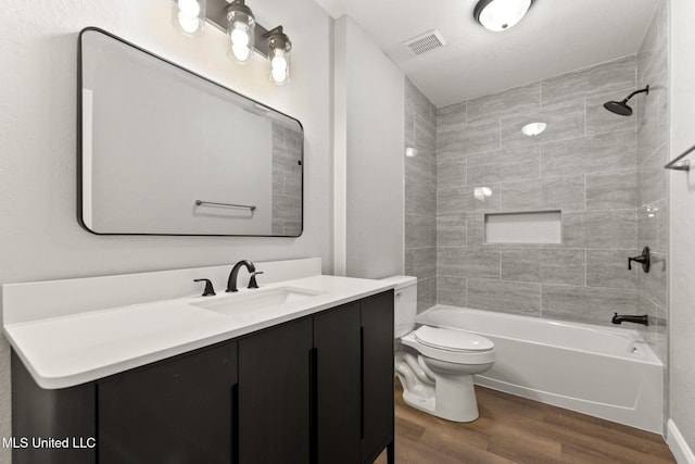 2518 El Viernes St, Gautier, MS 39553 - bathroom with wood finished floors, vanity, and shower / tub combination