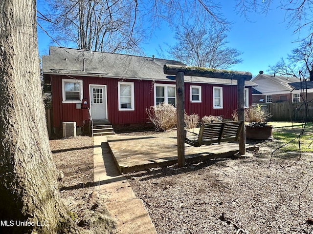 back of property with central AC unit