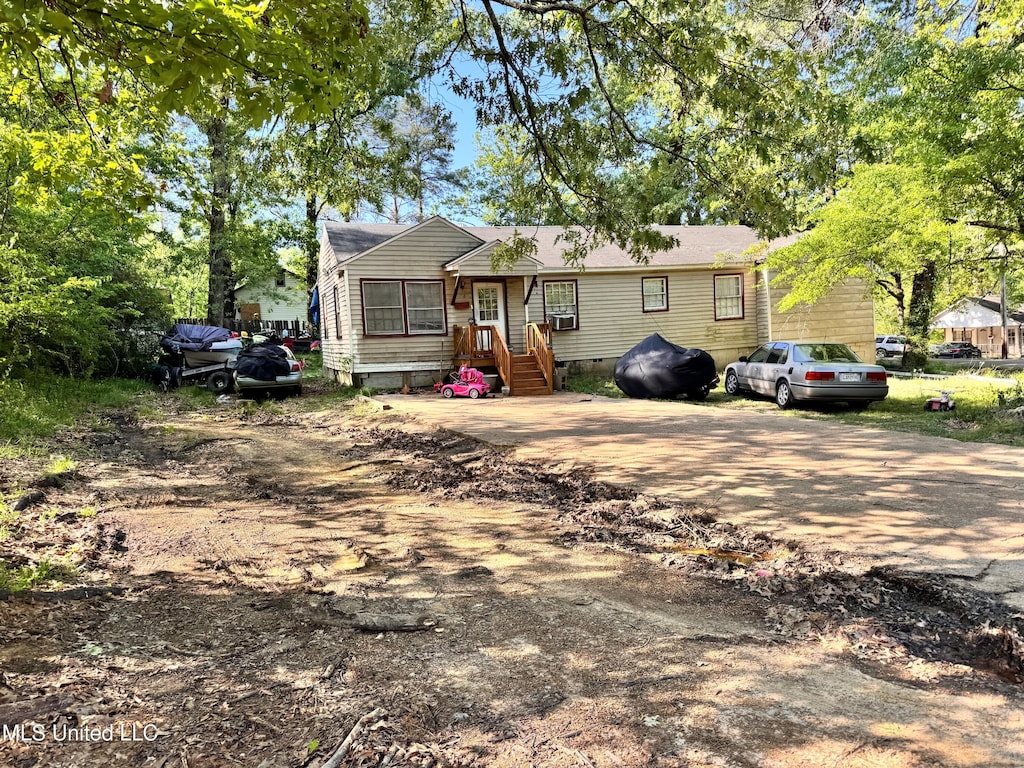 view of front of house with crawl space
