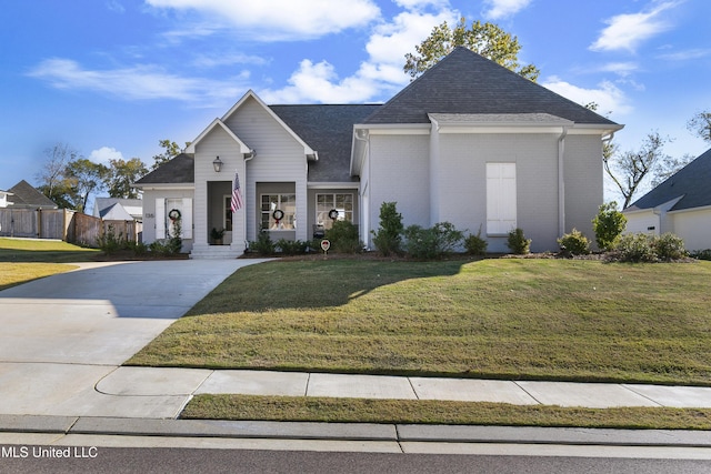 view of front of home with a front lawn