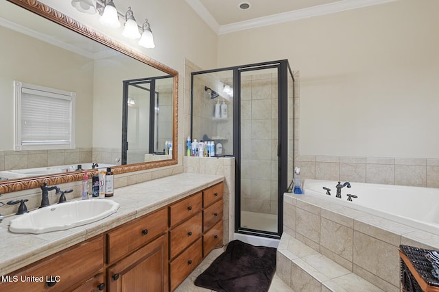 bathroom featuring crown molding, vanity, and separate shower and tub