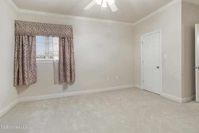 unfurnished room with light carpet, ornamental molding, and ceiling fan