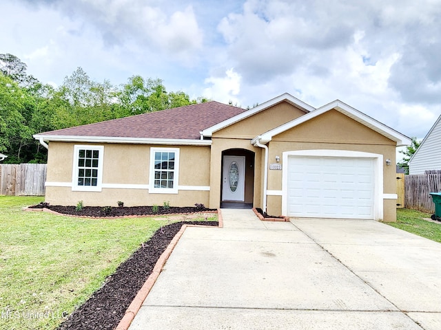 ranch-style house featuring stucco siding, a front lawn, fence, and driveway