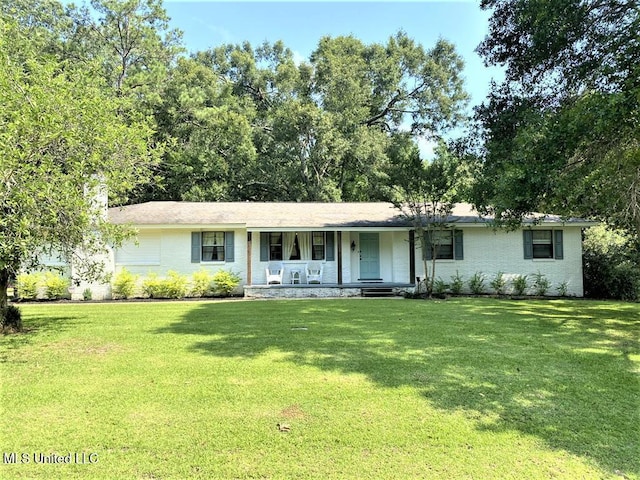 ranch-style house featuring a porch and a front lawn