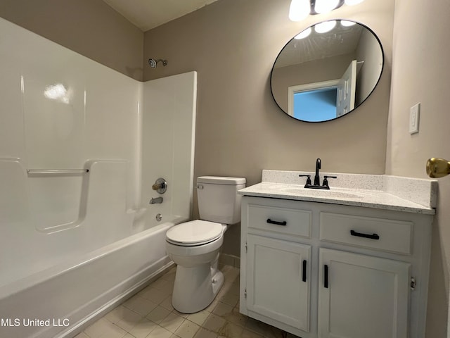 full bathroom featuring tile patterned floors, toilet, vanity, and tub / shower combination