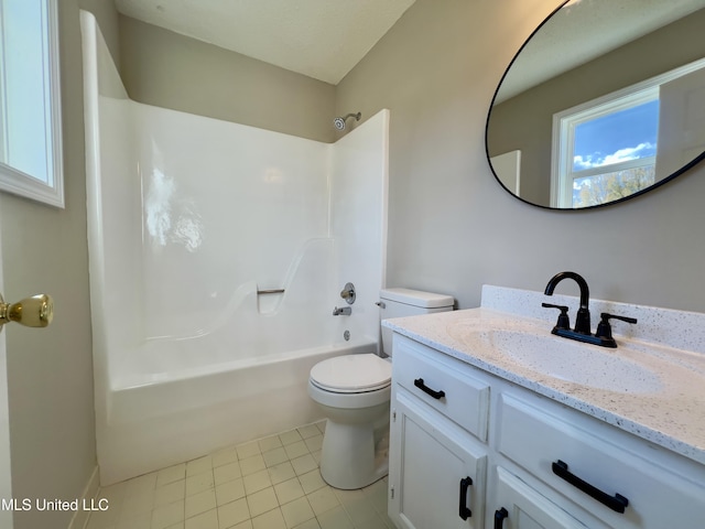 full bathroom featuring tile patterned floors, vanity, toilet, and tub / shower combination