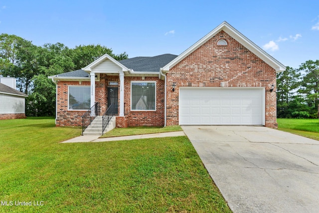 10566 W River Vue, Biloxi, MS 39532 - view of front of home featuring a garage, a front lawn, brick siding, driveway, and roof with shingles