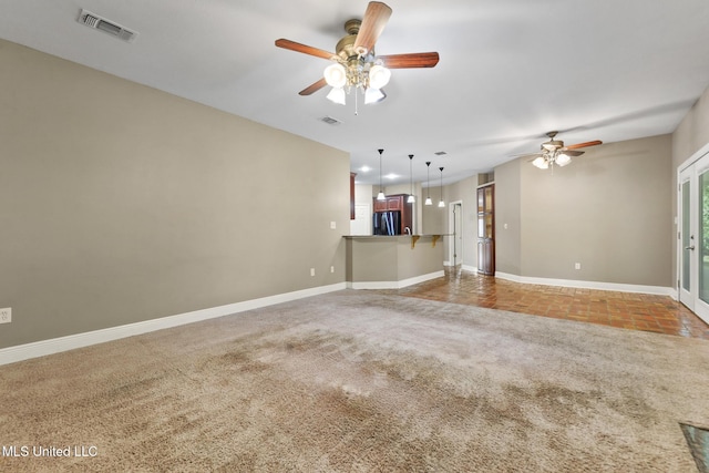 10566 W River Vue, Biloxi, MS 39532 - unfurnished living room with ceiling fan and carpet flooring