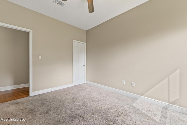 10566 W River Vue, Biloxi, MS 39532 - unfurnished bedroom featuring carpet and ceiling fan