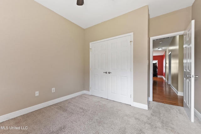 10566 W River Vue, Biloxi, MS 39532 - unfurnished bedroom featuring carpet flooring and a ceiling fan